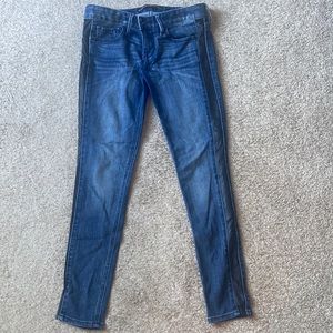 Express jeans Size 0 Regular with leather running down left and right sides